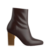Block Heel Kit 4 Light Wood shown on the Amy Bootie Chocolate Stretch Leather upper. Pashion convertible heels go from heel to flat and are customizable with interchangeable heel kits.