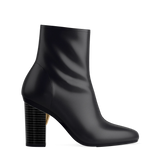Block Heel Kit 4 Black Wood shown on the Amy Bootie Coal Stretch Leather upper. Pashion convertible heels go from heel to flat and are customizable with interchangeable heel kits.