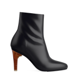 Stiletto Heel Kit 4 Wood shown on the Amy Bootie Coal Stretch Leather upper. Pashion convertible heels go from heel to flat and are customizable with interchangeable heel kits.