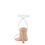 back view of transaprent strappy high heel stiletto sandal with a beige footbed