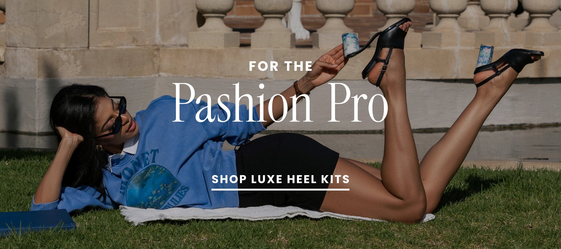 Woman lying on grass wearing high heels with promotional text overlay.