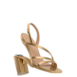 a convertible, matte gold strappy open toe block heel sandal