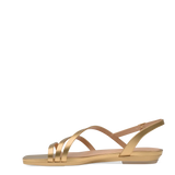 side view of a matte gold strappy open toe  flat sandal
