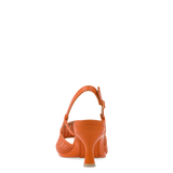 an orange, open toe mule sandal with mesh detail and adjustable strap and kitten flare stiletto heel