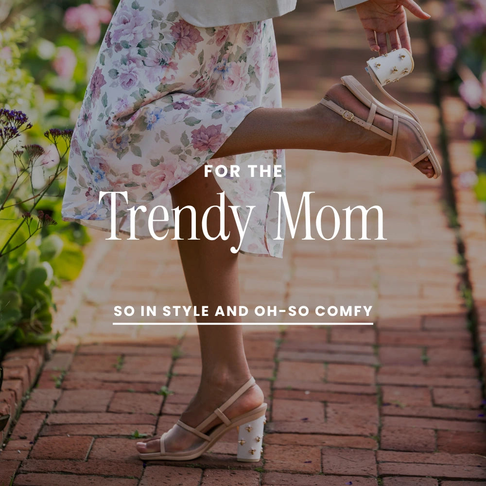 Person wearing a floral dress and convertible high heel sandals on a brick path with text 'For the Trendy Mom'.